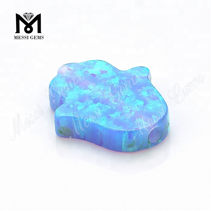 Созданные в лаборатории синтетические россыпью 11 x 13 x 2,5 мм голубые опаловые камни хамса